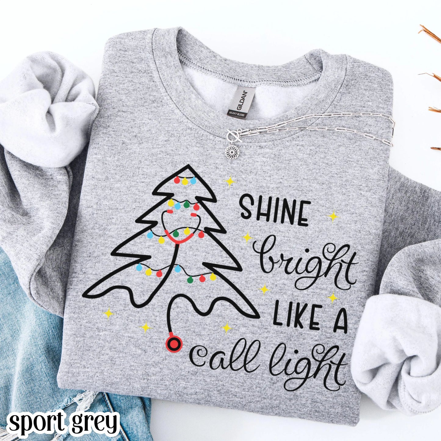 Shine Bright Like A Call Light Christmas Nurse Sweatshirt