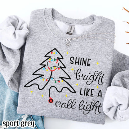 Shine Bright Like A Call Light Christmas Nurse Sweatshirt